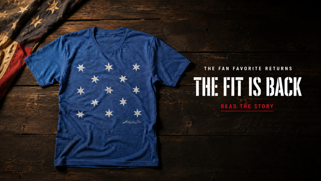 Next Level tee back at 1776 United, George Washington HQ Flag shirt on dark wood